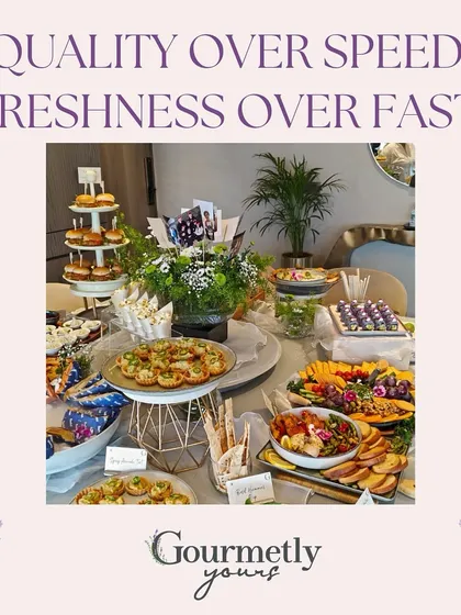 "Quality over speed. Freshness over fast." This graphic, featuring a beautiful spread, encapsulates our brand philosophy of crafting every dish with care and the best ingredients.
