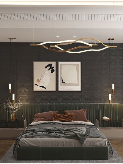 This master bedroom uses a dark, textured wall and a deep green upholstered headboard to create a cozy and enveloping feel. The modern, wave-like chandelier adds a sculptural element overhead.