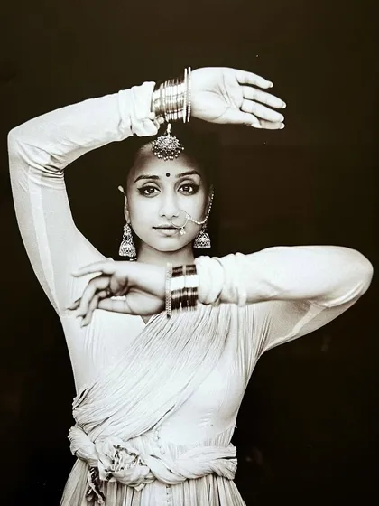 A sepia-toned portrait capturing the essence of a courtesan from history. This photoshoot was a beautiful exploration of historical characters through costume, pose, and expression.