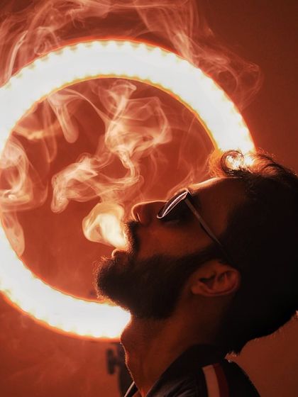 A creative shot from my new press kit photoshoot, using a ring light and smoke to create a cool effect.