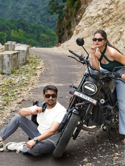 A relaxed and cool shot of the couple taking a break on their mountain road trip. It feels natural and captures their personalities perfectly.