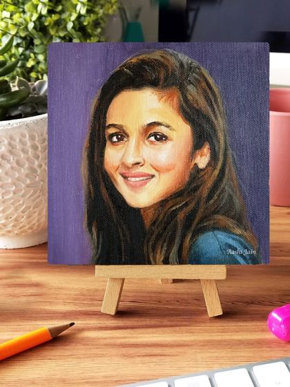 A miniature painting of Alia Bhatt, perfect for a desk display.