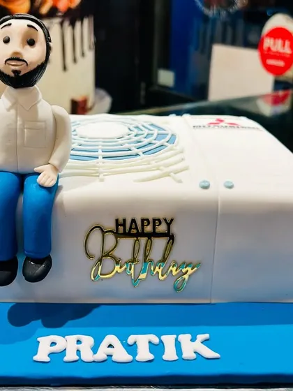 For this corporate event, I created a hyper-realistic cake replica of a Mitsubishi air conditioner unit. These 3D product replica cakes are perfect for product launches or celebrating the team behind the brand.