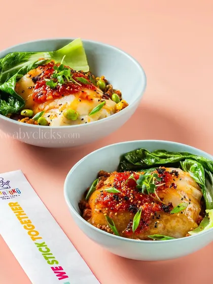 A beautifully presented fish dish in a bowl, shot for Harajuku Tokyo Cafe.
