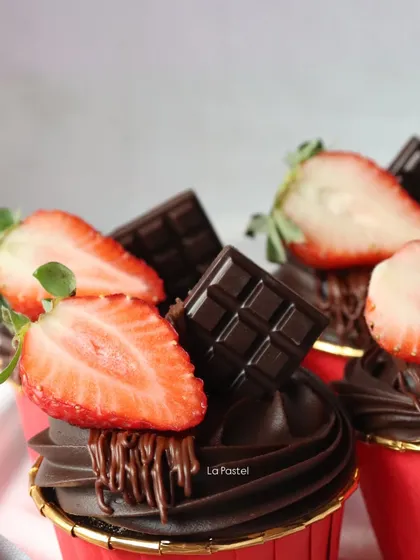 For the chocolate lovers, I make these decadent chocolate cupcakes, topped with fresh strawberries and a mini chocolate bar.