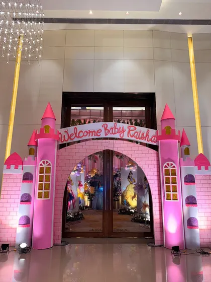 We built a fairytale entrance for a baby welcome ceremony with this grand pink castle archway. This kind of statement entrance sets a magical tone for the event from the moment guests arrive.