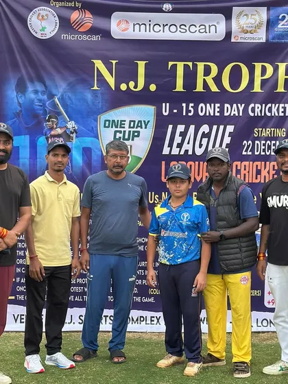 Posing with the organizers and a young player at the N.J. Trophy event. We are grateful for these opportunities.