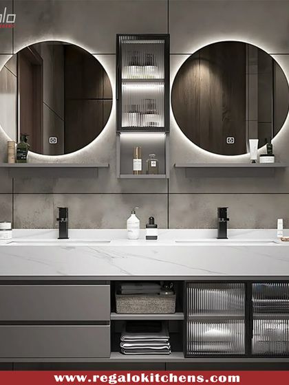 A contemporary vanity with dual backlit mirrors and a mix of open and closed storage. The fluted glass cabinet doors add texture and visual interest.