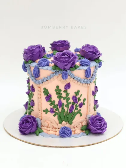 This vintage-style cake is decorated entirely with buttercream. I teach how to pipe delicate purple roses, swags, and borders to create a classic, elegant look that’s perfect for any celebration.