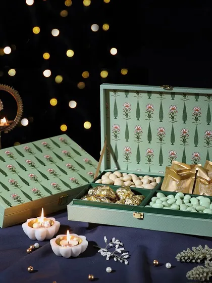 Unbox happiness with this exclusive hamper. It's filled with our butter cookies, rabdi cashews, pista white chocolate almonds, and fruit & nut dark chocolate clusters.