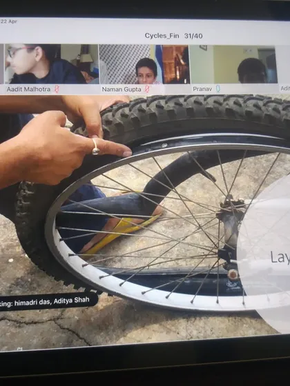 An instructor points out the different layers of a bicycle tire during a live online session. Our virtual workshops are just as hands on, with clear demonstrations that guide participants through each step.