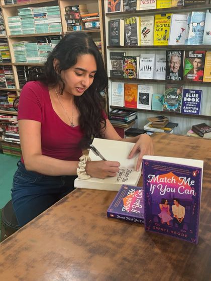 A photo from a January photo dump, signing books at a store. Attending lit fests and meeting author friends is one of the best parts of the job.