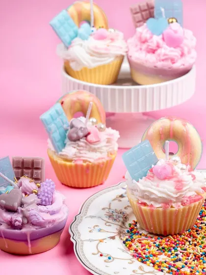 Learn to make these adorable cupcake candles, decorated with colorful sprinkles and wax toppings. They are a perfect starting point for anyone interested in dessert candle making.