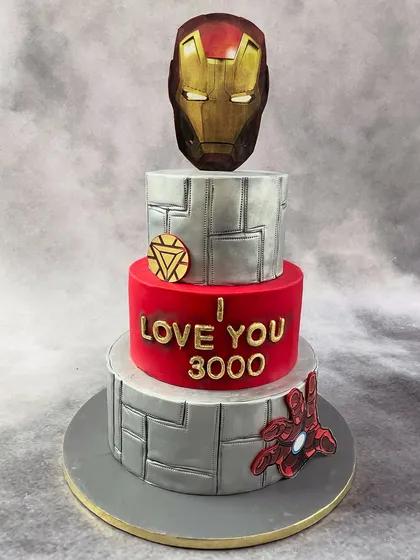 As a huge Marvel fan myself, I poured my heart into this three-tier Iron Man cake for my husband. It's a tribute that says "I love you 3000" and shows my passion for pop culture themes.