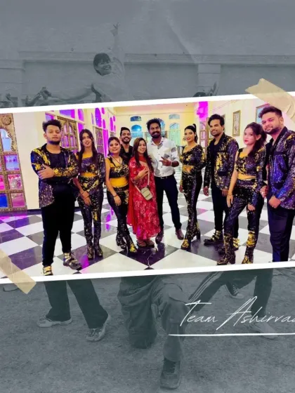 Our team with a client after a successful show. We are proud to stand with our performers, dressed in their dazzling costumes, ready to create magic.