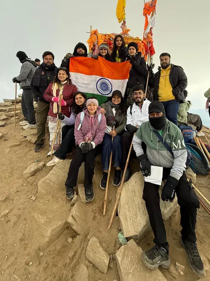 Our group proudly holding the Indian flag at the Chandrashila summit. A moment of shared achievement and patriotism high up in the Himalayas.