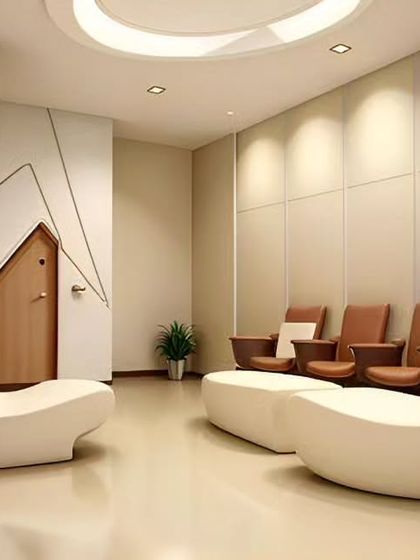 In this minimalist waiting area, we used sculptural, ergonomic seating and a neutral color palette to create a sense of calm and sophistication. The design focuses on clean lines and uncluttered space, ideal for a modern clinic or boutique firm.