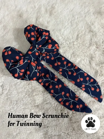This is the human bow scrunchie from my cherry print twinning set. It's made from the same soft fabric as the pet accessories for a perfectly coordinated look.