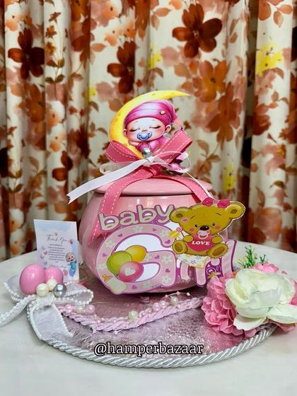 This unique 'handi' style hamper is another beautiful option for a baby girl announcement.