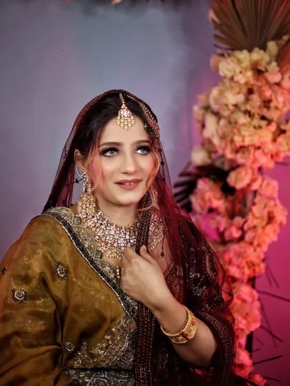 A close-up from our bridal campaign. The soft lighting and the model's gentle expression create a truly mesmerizing portrait.