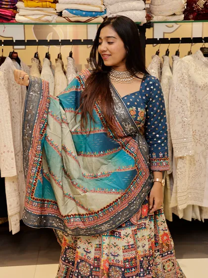 Another look at this masterpiece, showing how the dupatta drapes beautifully to complete the look.
