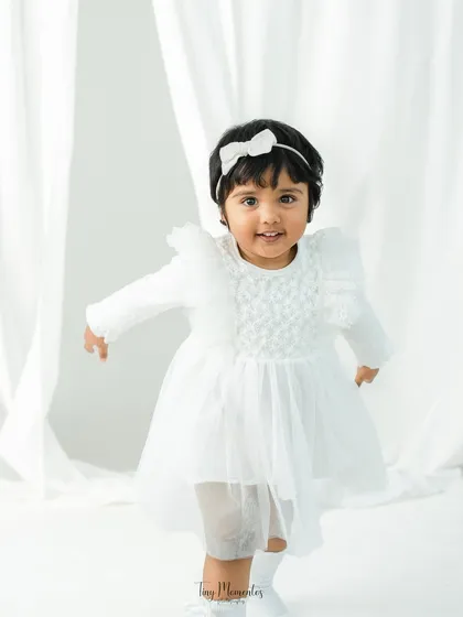 An angelic moment with this two-year-old. My minimalist portraits use soft, natural light to create timeless images that feel both elegant and pure.