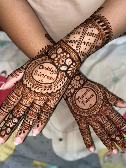 A lovely design celebrating the parents with 'Daddy's Princess' and 'Mummy's Prince' inside ornate mandalas, perfect for a baby shower.