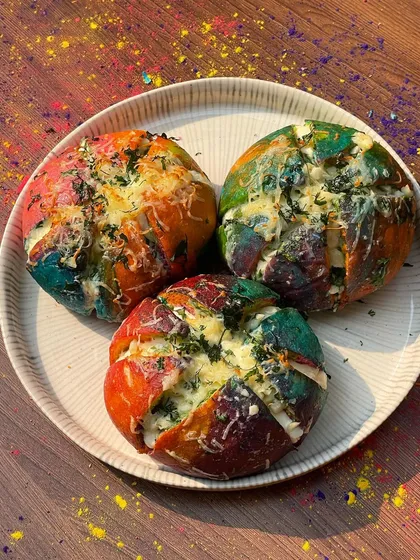 For the festival of colors, I created these vibrant Holi-themed Korean Cream Cheese Buns, with a rainbow-colored dough.