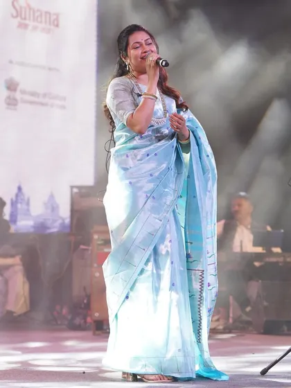 Capturing the energy of a live performance is key, and for Priyanka Barve's "Soul India" concert, I chose this beautiful pastel Paithani saree. The style was designed for both elegance and comfort, allowing her to connect with the audience effortlessly.