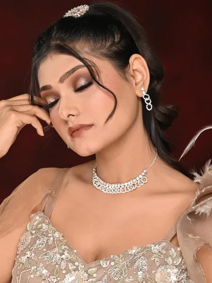 This image showcases the soft, blended quality of the spotlight eye makeup. The skin is kept fresh and glowing, with a simple nude lip to ensure the eyes remain the focal point.