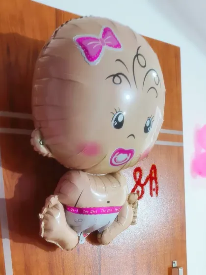 A simple yet sweet balloon decoration to welcome a baby girl. This is perfect for small, intimate family gatherings at home.