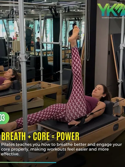 Breath plus core equals power. This client demonstrates a leg stretch on the reformer, a classic move that teaches you how to breathe better and engage your core for more effective workouts.