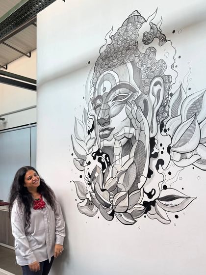 To bring a sense of calm to a busy factory floor, we installed this large-scale Buddha mural. The meditative art serves as a constant reminder to pause and find balance, infusing the industrial environment with peaceful energy.