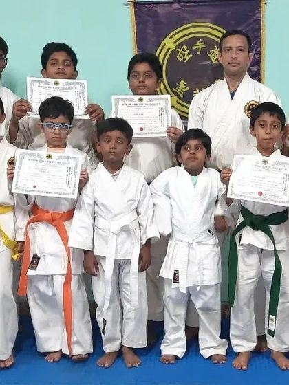 A group of my students after their successful kyu grading. Each one has earned their rank through consistent effort and discipline.