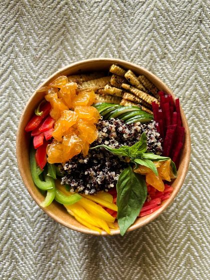 Our special summer salads are all about fresh fruits and tangy dressings. This bowl features sweet orange slices, quinoa, and fresh basil for a light and refreshing meal.