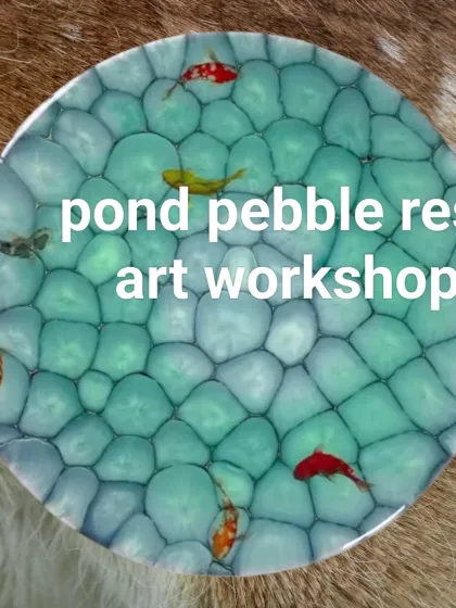 This image shows a finished pond pebble resin art piece. I teach this technique in my professional workshops, both online and offline in Delhi.