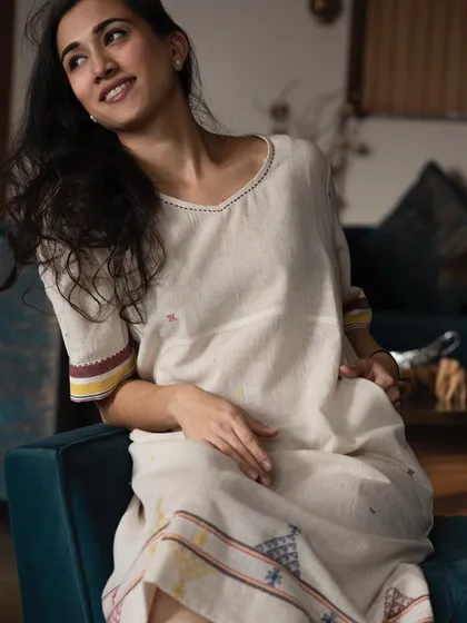 Showcasing a light and breezy summer dress by Designs by Pala. This demonstrates my versatility in modeling comfortable, elegant casual wear with a relaxed and approachable demeanor.
