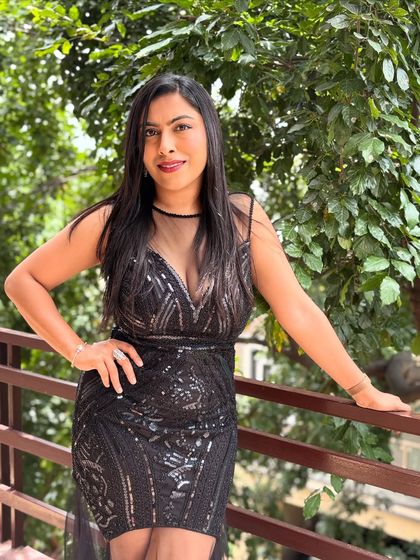 A confident pose before taking the stage. I bring years of experience and a calm demeanor to every event, ensuring you can relax and enjoy the evening.