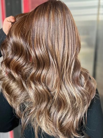 Long hair color transformation. This balayage adds beautiful, light-reflecting dimension to long, flowing locks.