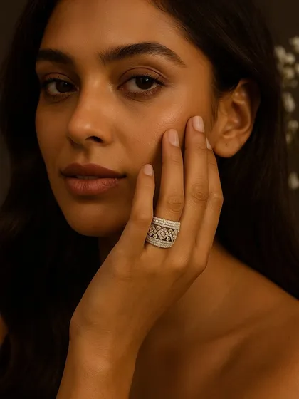 This wide band diamond ring is a statement of power, grace, and individuality. Made with precision and layered with brilliance, it is designed to capture every gaze.