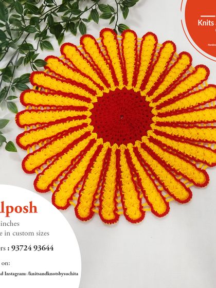 This sunflower-inspired thalposh is one of my favorites to make. The yellow petals radiate from a red center, creating a bold and cheerful look.