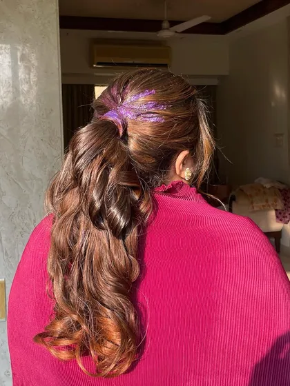 A final look at the glitter-accented ponytail. This is a great way to participate in the glitter trend without it being overwhelming.