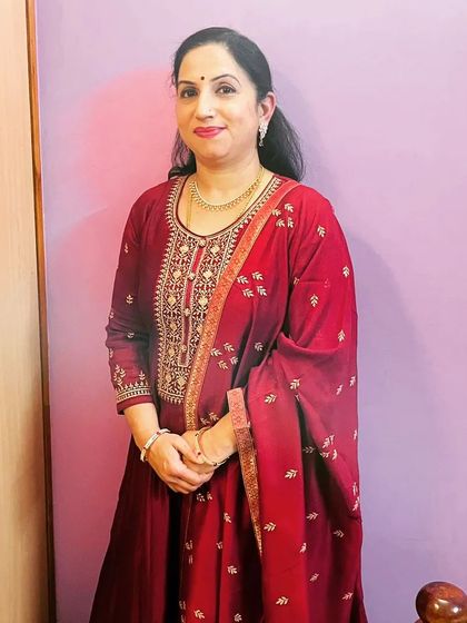 A portrait of the final look for the birthday celebration. The makeup is designed to look sophisticated and timeless on mature skin.