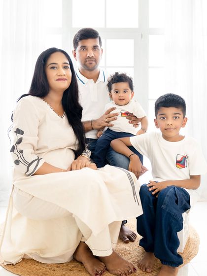 A slightly different arrangement of the family portrait, creating a warm and connected feel.