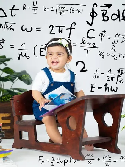 A little genius at work. This fun, creative theme uses a backdrop of scientific formulas for a smart and playful portrait.