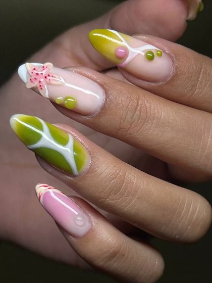 A whimsical, ocean-inspired nail art design. This set features 3D elements like a starfish, plus textures and colors that evoke a vibrant underwater scene.