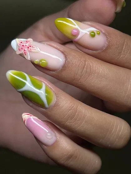 A whimsical, ocean-inspired nail art design. This set features 3D elements like a starfish, plus textures and colors that evoke a vibrant underwater scene.