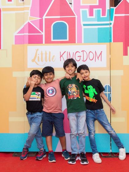 Best friends forever! A group of boys posing in front of our colorful photo backdrop. I always include fun photo ops to help you capture the happy memories.