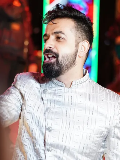 A close-up of me hyping up the crowd during a dance set. It's all about that infectious energy.