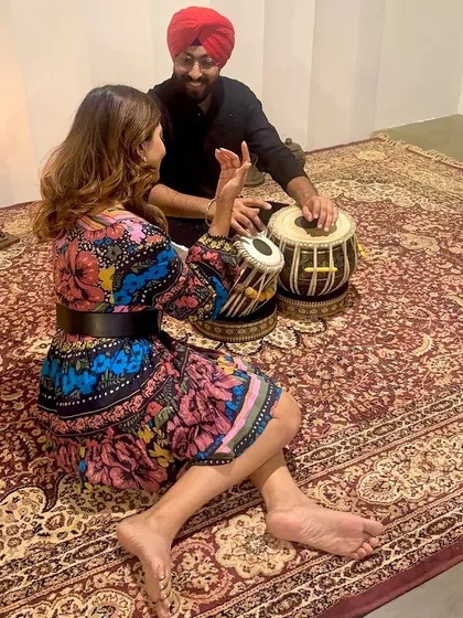 A glimpse into a one-on-one tabla lesson. I'm guiding an adult beginner through the basic hand positions and sounds of the tabla. It's never too late to start learning!